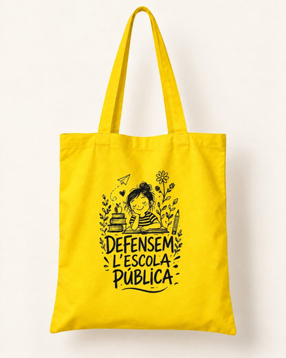 Bossa de tela groga “Defensem l’escola pública” — vista frontal