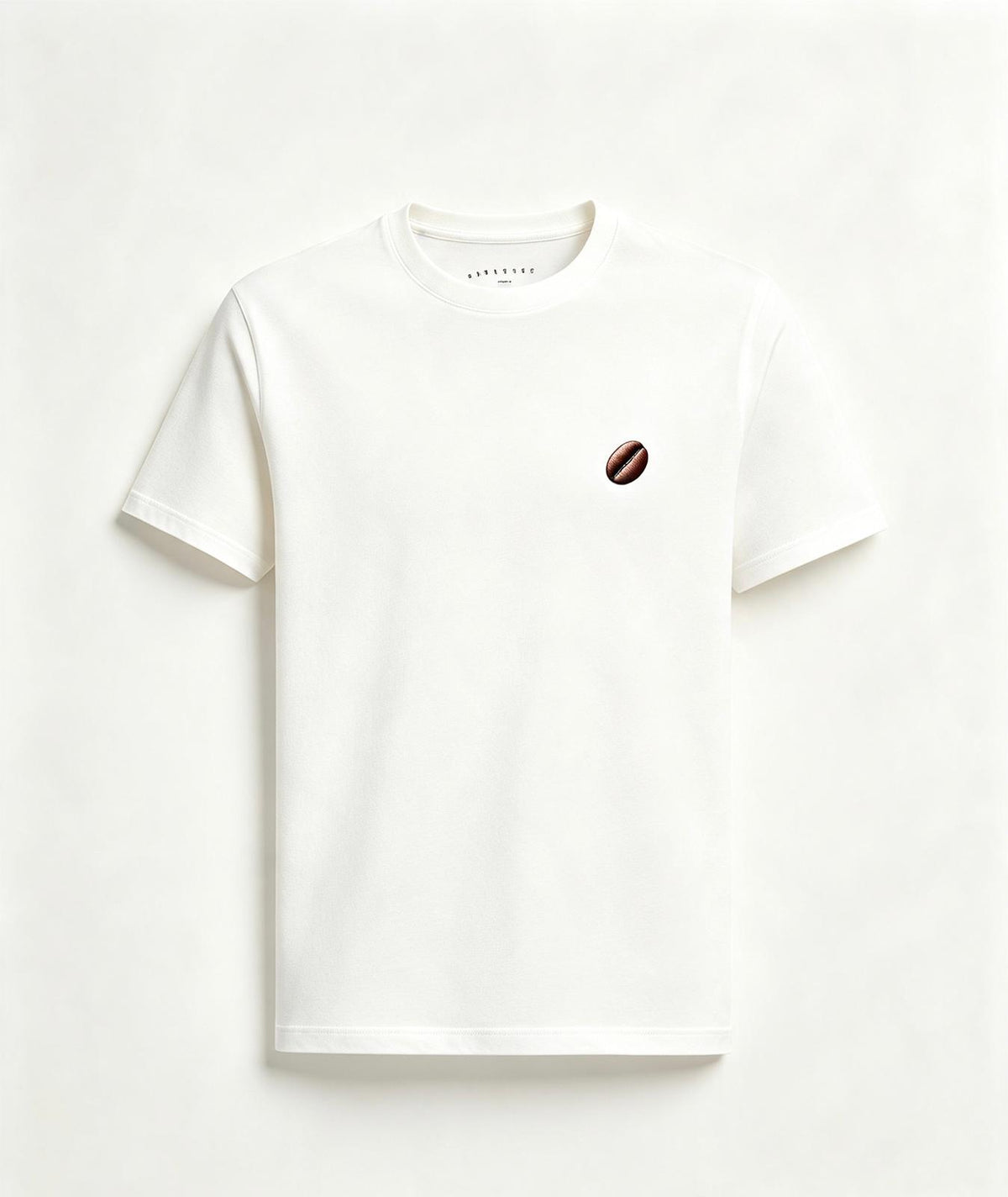 Camiseta "Orgullo Colombiano" · Blanca — grano de café en el pecho